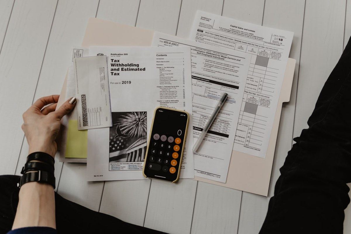 Strata corporation board reviewing financial documents and budget reports